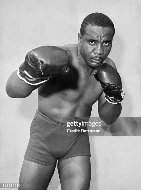 South Fallsburg, New York- Sonny Liston is shown in these posed action photos at his Pines Hotel training camp in preparation for his upcoming bout...