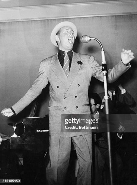 France- Charles Trenet, singing at mike in France.