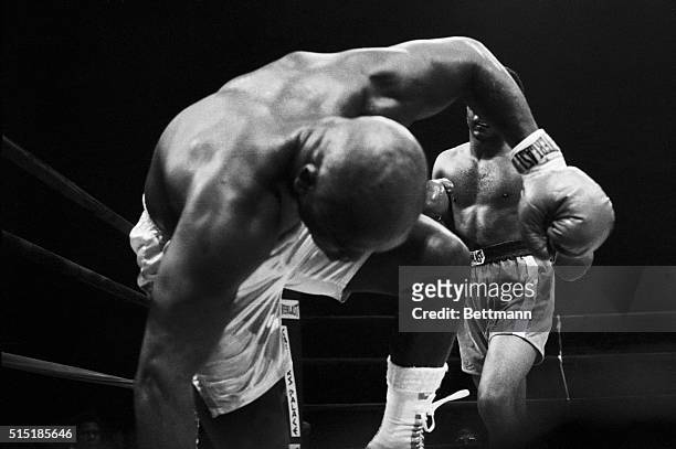 Uniondale, New YorkUnder a barrage by George Foreman, Joe Frazier heads for the canvas in the fifth round.