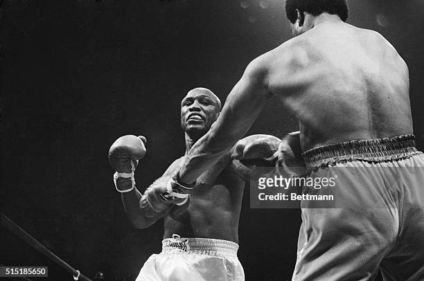 Uniondale, NY- Joe Frazier suffers at the hands of George Foreman in the first round of a bout between the two former heavyweight champions at the...