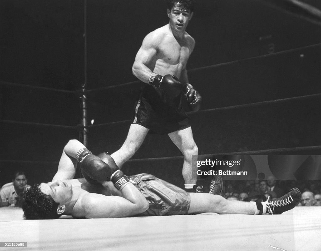 Rocky Graziano Stands Over Opponent