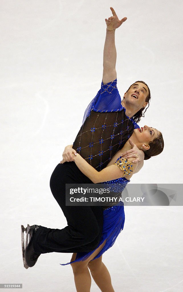 Beata Handra of the US carries her compatriot Charles Sinek during