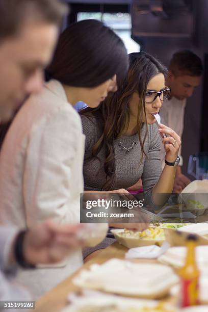 work colleagues on lunch break - chipotle stock pictures, royalty-free photos & images