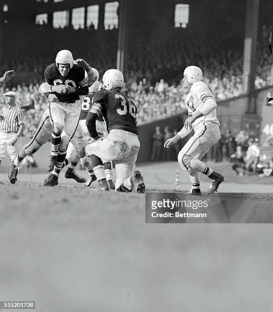 San Francisco 49ers' hit Otto Graham after a second period incomplete pass in game with Cleveland Browns in Municipal Stadium here today 10/27. It...