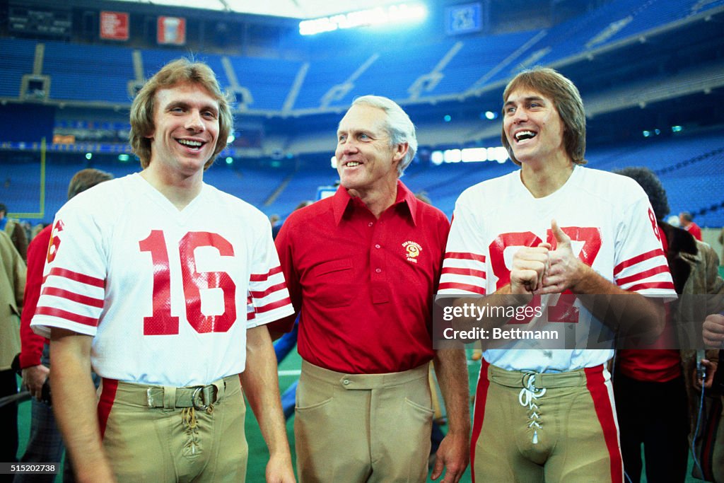 Bill Walsh Posing with Players