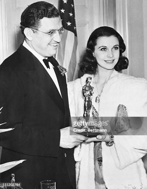 Hollywood, California- Vivien Leigh, chosen as the actress who gave best screen performance in 1939, gets her gold "Oscar" at twelfth annual Academy...