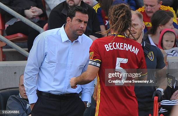 Head coach Jeff Cassar talks with his player Kyle Beckerman of Real Salt Lake in the first half of their 2-1 win over Seattle Sounders FC at Rio...