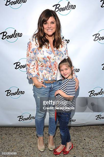 Actress Tiffani Thiessen and daughter Harper attend the Grand Opening of Bowlero on March 12, 2016 in Woodland Hills, California.