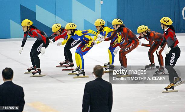 Chinese Yang Yang is pushed by her compatriot Chunlu Wang, Min-Jin Joo of South Korea is pushed by her compatriot Hye-Won Park, Canadian Isabelle...