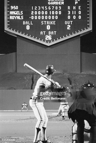 Kansas City, MO- The scoreboard tells the story as Angels' Nolan Ryan pitches to Royals' Amos Otis with two outs in the 9th inning, 5/15. Ryan got...