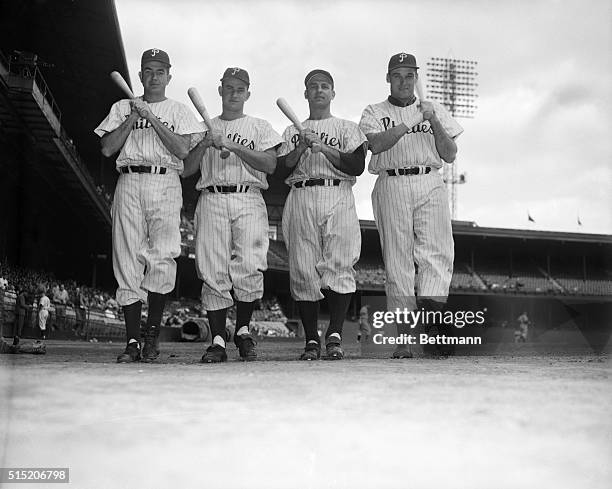 Philadelphia, PA- Above at left are the star artillery men of the Philadelphia Phillies, who seem to have the National League Pennant just about...