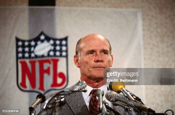 Tom Landry, Dallas Cowboys football coach, gives a press conference in Washington, DC, before the 1983 National Football Conference game between...