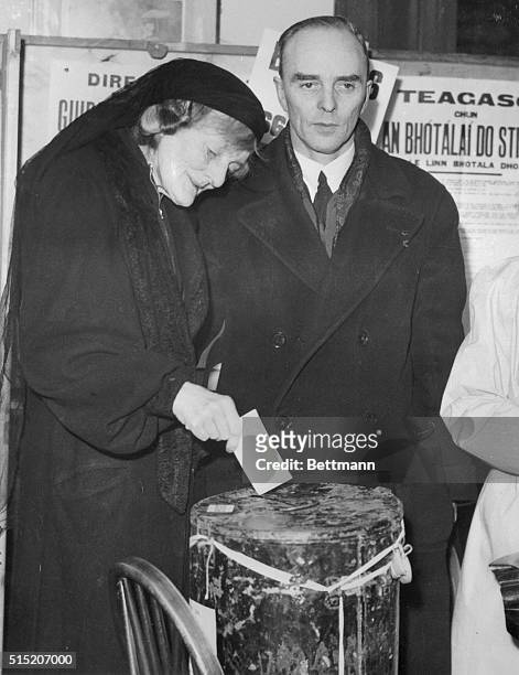 Madam Maud Gonne one known as "The World's Most Beautiful Woman", casts her vote in the Eire General Elections. With her is her son, Sean MacBride,...