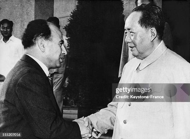 Krim Belkacem of the Algerian Provisional Government with Mao Tse Toung in Beijing, China, circa 1950.