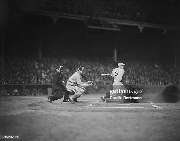 With a wild swing, Pete Coscarart of the Brooklyn Dodgers, strikes out in the fifth inning as Cincinnati pitcher Johnny Vander Meer hurled his second...