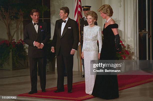 Washington, DC: Prince Charles and Princess Diana pose with President and Nancy Reagan on the North Portico of the White House.