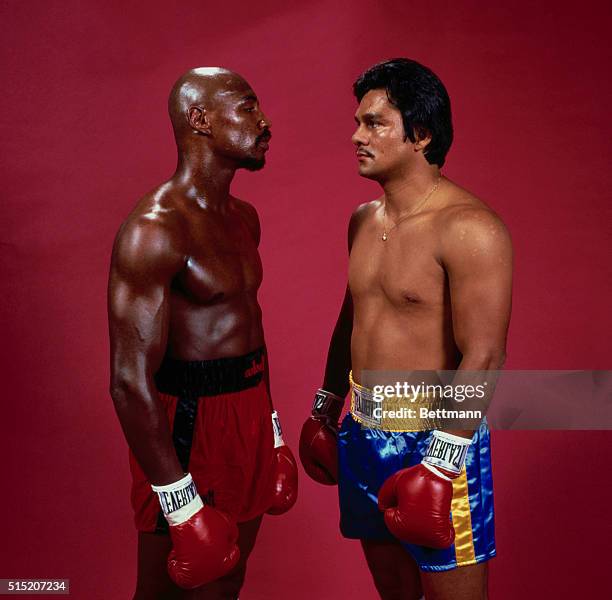 New York, New York: Challenger Roberto Duran and middleweight champ Marvin Hagler are eyeball to eyeball as they meet for photo session 9/16. The two...