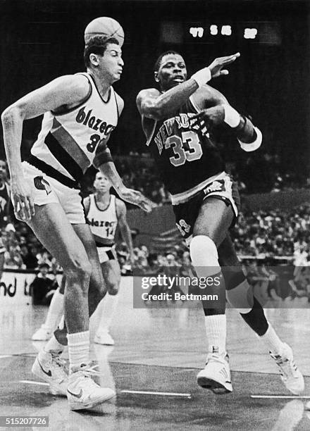 Sam Bowie of the Portland Trailblazers blocks New York Knicks' Patrick Ewing during a basketball game in Portland, Oregon.