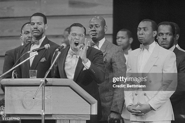 Minister Louis Farrakhan stresses point as bodyguards look on during address at University of Pittsburgh 11/14. He said, "Hitler was great, but not...