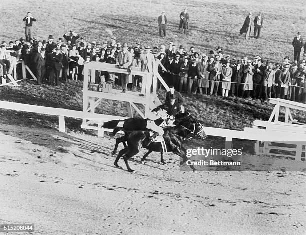 In the greatest match race in history, Seabiscuit, ridden by George Woolf, finished four lengths ahead of War Admiral in the record breaking time of...