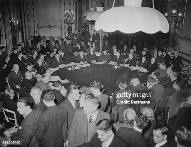 The Big Four Foreign Ministers and their chief advisers are pictured around the conference table in Lancaster House at the opening of the meeting on...