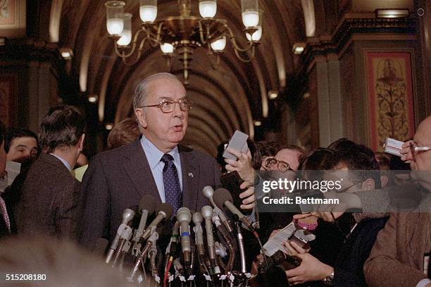 Washington: North Carolina Republican Senator Jesse Helms, speaks to reporters after 45 Senate Republicans voted 24-17 to put him in the ranking seat...