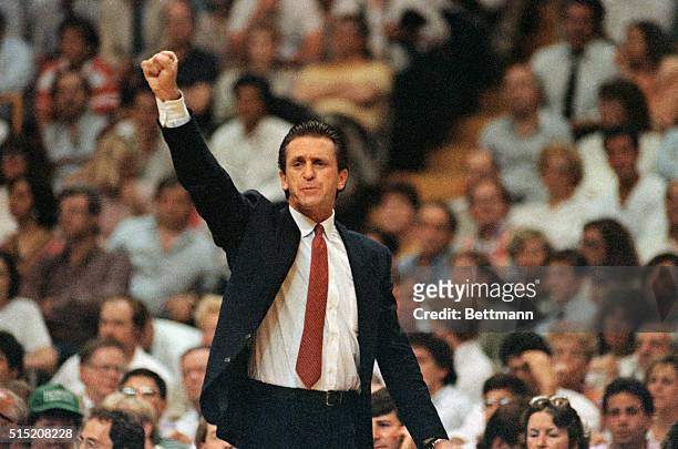 Boston: Los Angeles Lakers coach Pat Riley raises his fist as the Lakers take the lead and go on to win game 4 in the final seconds to defeat Boston,...