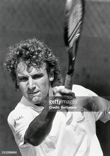 New York, NY: Sweden's Mats Wilander follows through on a return to Thierry Champion during Us Open match.