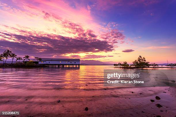 sugar wharf at sunrise - port douglas stock-fotos und bilder