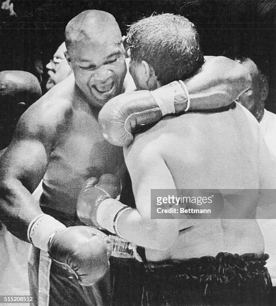 Former World Heavyweight champ George Foreman hugs opponent Steve Zouski following their bout at the Arco Arena in Sacramento. Foreman, who was...