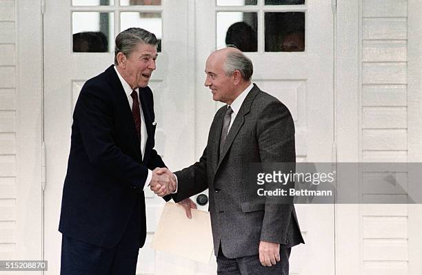 Concluding a morning meeting, President Ronald Reagan and Soviet General Secretary Mikhail Gorbachev shake hands. | Location: Reyjavik, Iceland.