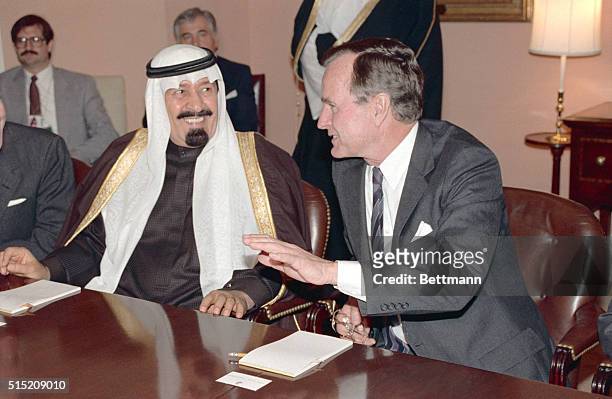 Abdullah bin Abdel Aziz, Prince of Saudi Arabia, talks with American president George Bush at the White House before moving on to the Arab summit in...