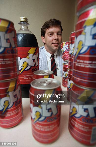 Carl Joseph Rapp C. J. Rapp of Rochester, New York, hoists a can of his invention ...