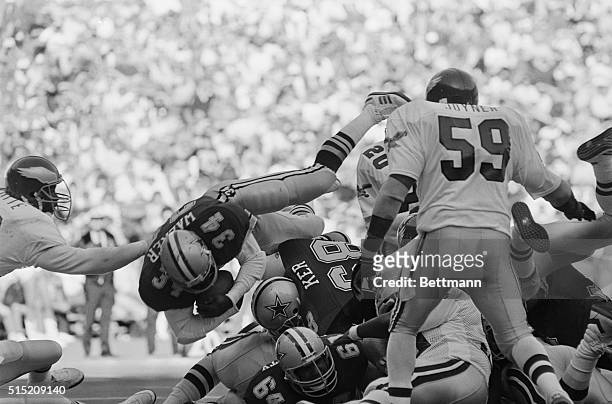 Philadelphia: Dallas fullback Herschel Walker goes high over the middle to score a touchdown during second quarter Philadelphia Eagles-Dallas Cowboys...