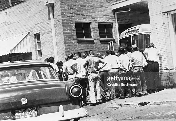 Mob of whites blocks the driveway exit at a bus terminal to keep a bus carrying 'Freedom Riders' from leaving Anniston, Alabama, 14th May 1961. Some...