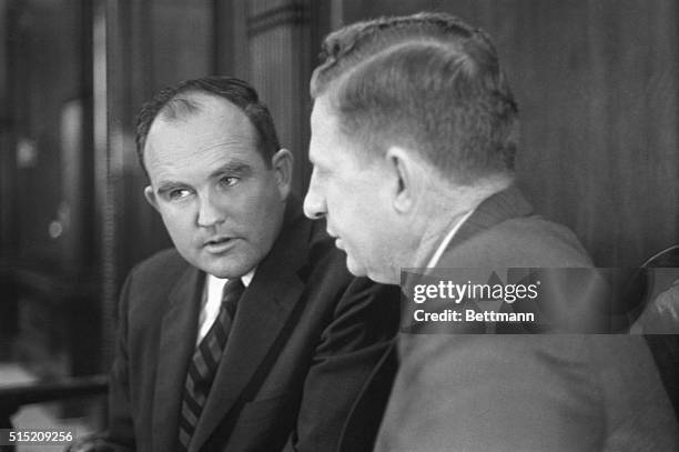 Gov. John Patterson , a worried look on his face, confers with Floyd Mann, Alabama Public Safety Director, at the Capitol here 5/22. Mann's...