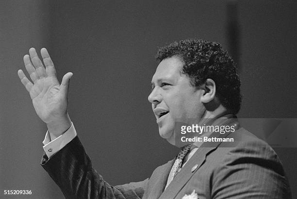 Former Mayor Maynard Jackson waves to students gathered at Morehouse College, Atlanta, Georgia, for the school's Founder's Day celebrations, in a...
