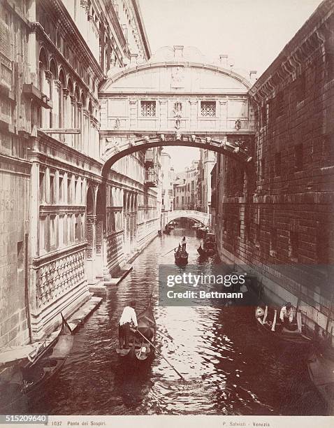 The Ponte dei Sospiri crosses the canal in Venice, Italy.