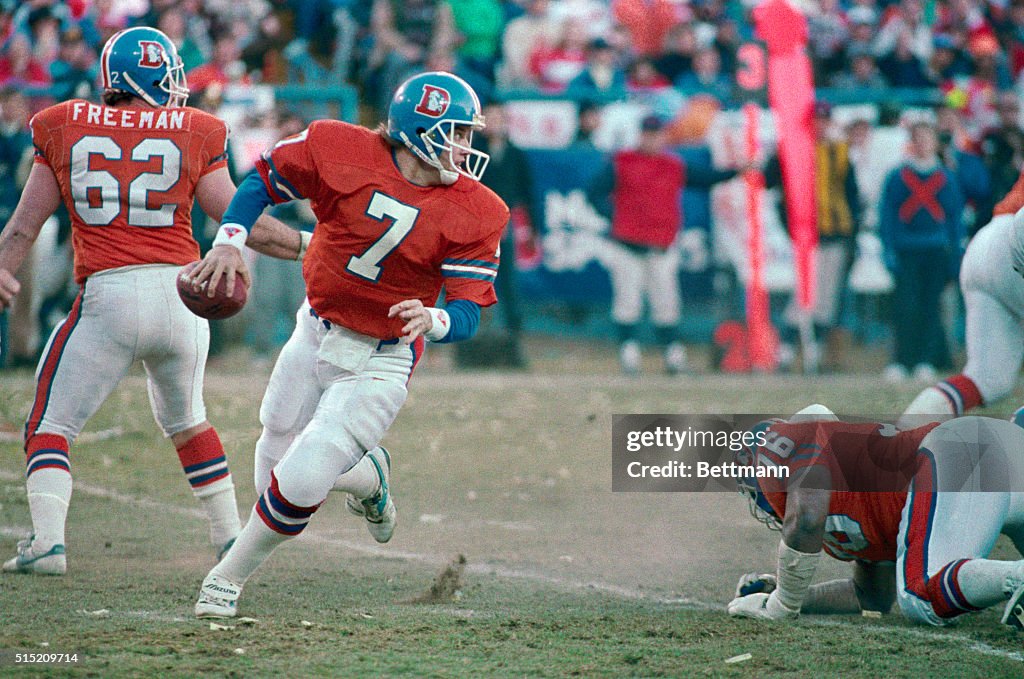 John Elway Preparing to Pass Football