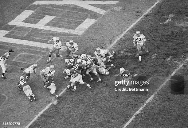 Billy Dale blocks by Jim Bertelsen and Bobby Wuensch , goes two yards for the winning touchdown in the fourth quarter as Texas defeated Notre Dame...