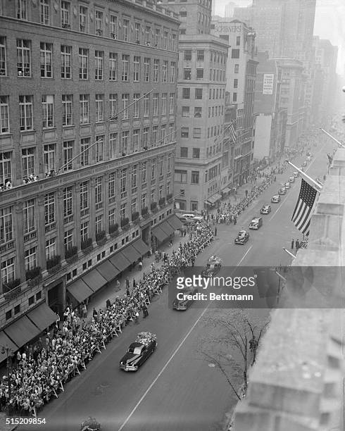 Babe's last journey. Crowds of mourning fans jam the sidewalks to watch the funeral procession for Babe Ruth as it moves toward St. Patrick's...