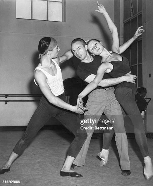 Now David Blair copies the pas de deux dance position that Balanchine is demonstrating. The Sadler's Wells Theatre Ballet was formed in December to...