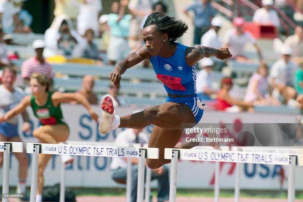 Jackie Joyner Jumping Hurdles