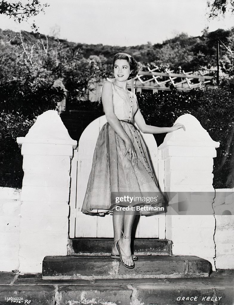 Grace Kelly, Wearing Designer Dress