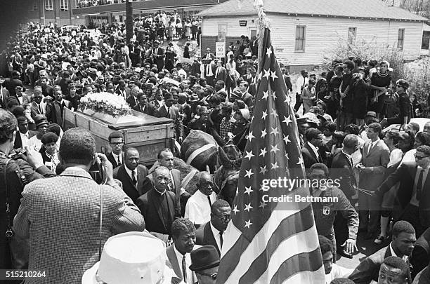 Atlanta, Georgia: Mule-drawn caisson bears the body of Dr. Martin Luther King, Jr., from church enroute to Morehouse College for memorial services.