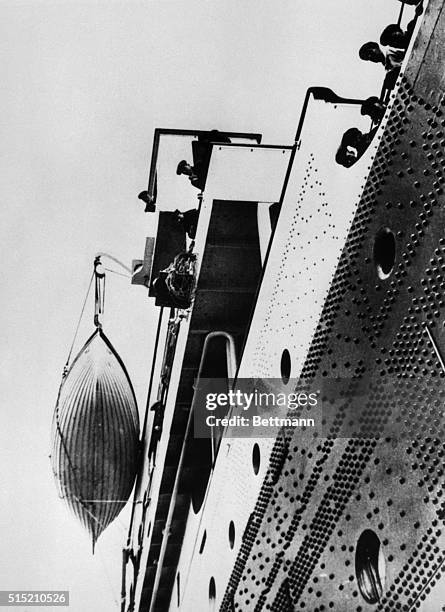 This grimly prophetic photo of the Titanic's bridge and one of its lifeboats was made by Reverend F.M. Browne, a passenger who got off the doomed...