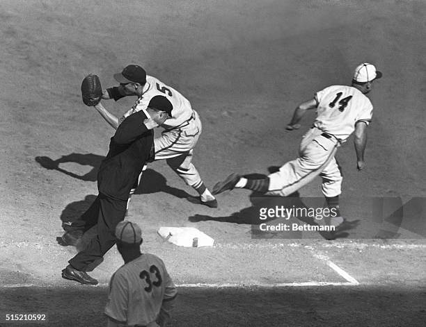 St. Louis, MO: St. Louis Browns' left fielder Zarilla dashes across the base too late, in the fourth inning of the fifth World Series game. Zarilla...