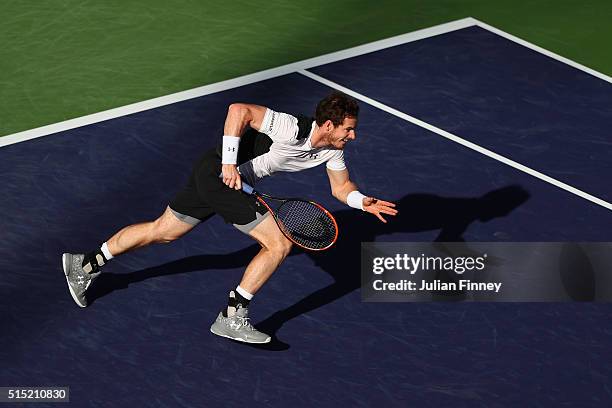 Andy Murray of Great Britain runs for a shot against Marcel Granollers of Spain during day six of the BNP Paribas Open at Indian Wells Tennis Garden...