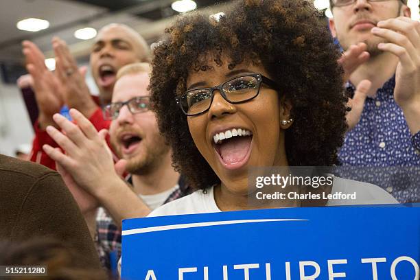 University of Illinois psychology student Amber Parker reacts as Democratic presidential candidate U.S. Sen. Bernie Sanders speaks in the Activities...