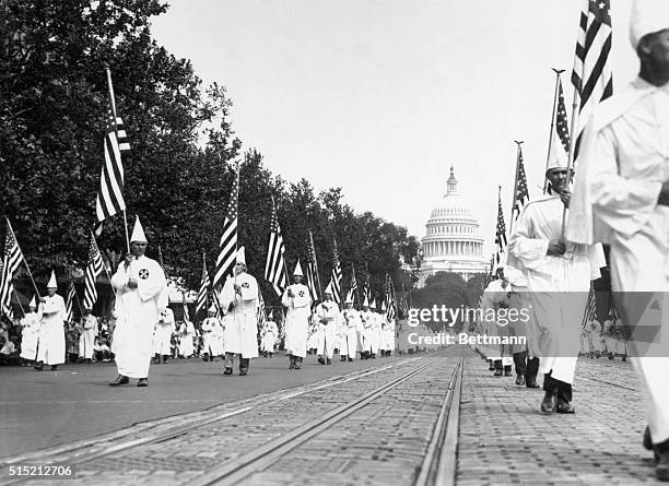 Washington, D.C.: General view of the Ku Klux Klan on parade along Pennsylvania Avenue in Washington, D.C. It was estimated that nearly...